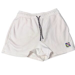Peloton Cream Shorts with Black Tag